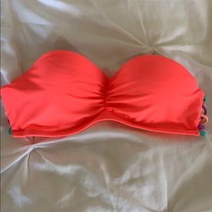 Coral bikini top with fun back
